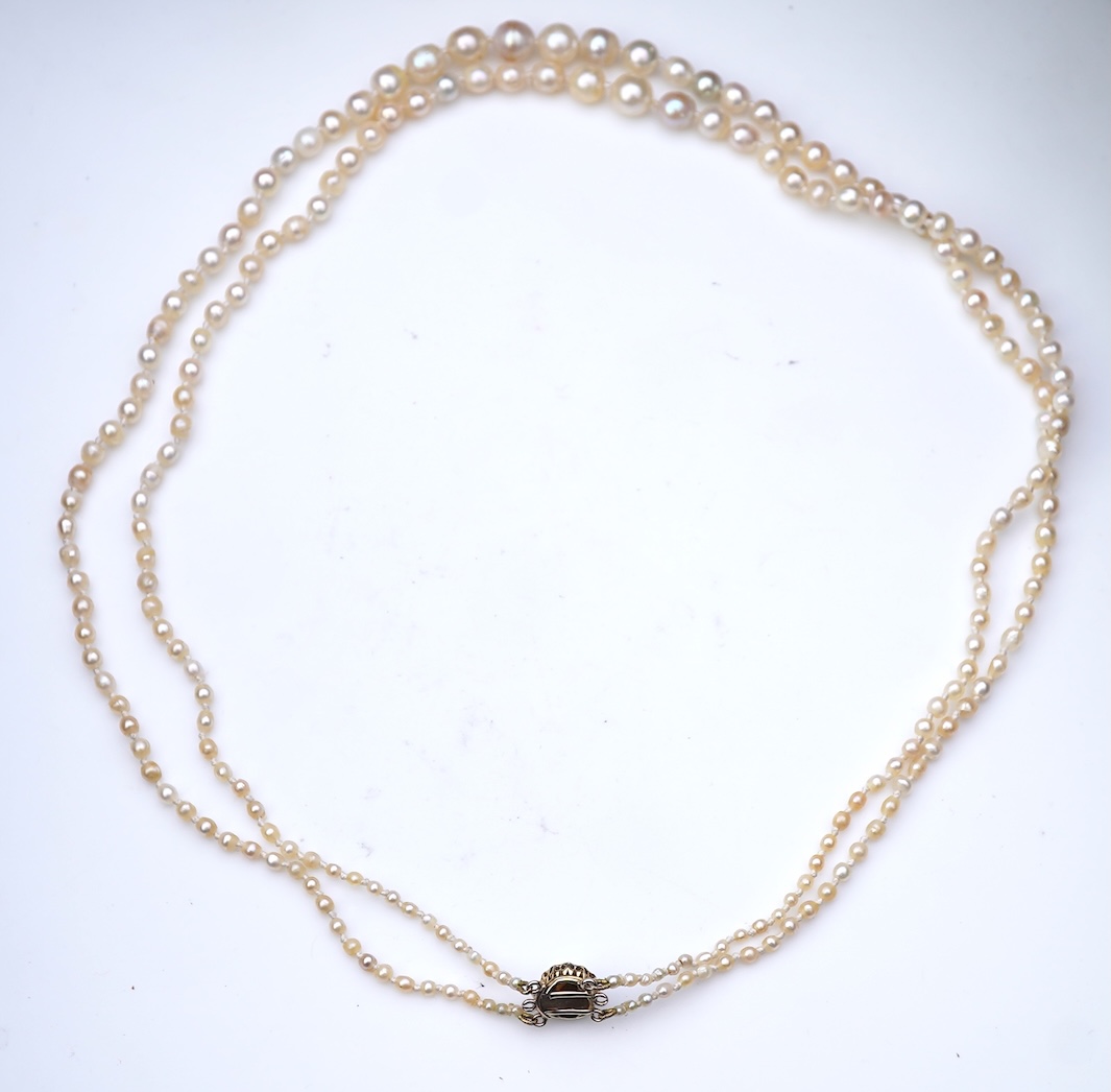 A natural pearl and diamond necklace, early 20th century
